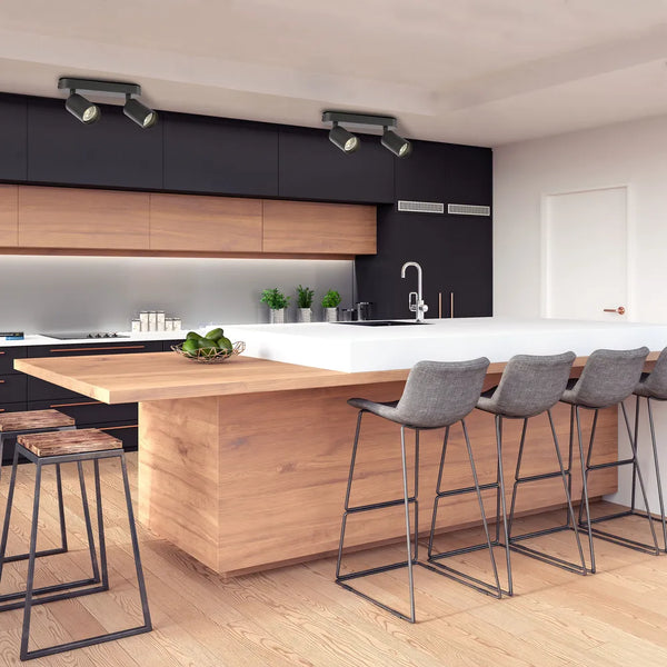 Stylish beam cylinder GU10 spotlight illuminating a modern living room with minimalist decor and warm ambiance. Perfect for accent lighting.172-03049