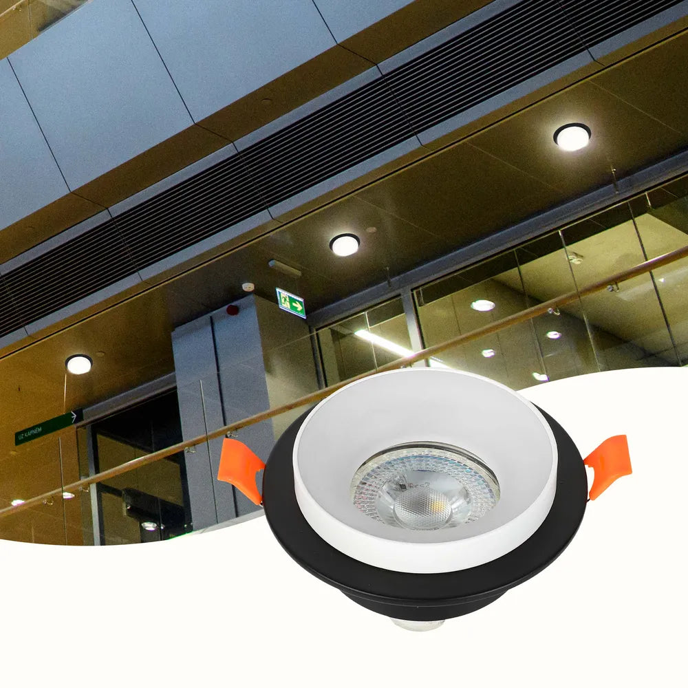 Sleek GU10 downlight fixture enhancing modern living room decor with stylish recessed lighting and glare guard for a cozy atmosphere.143-03430