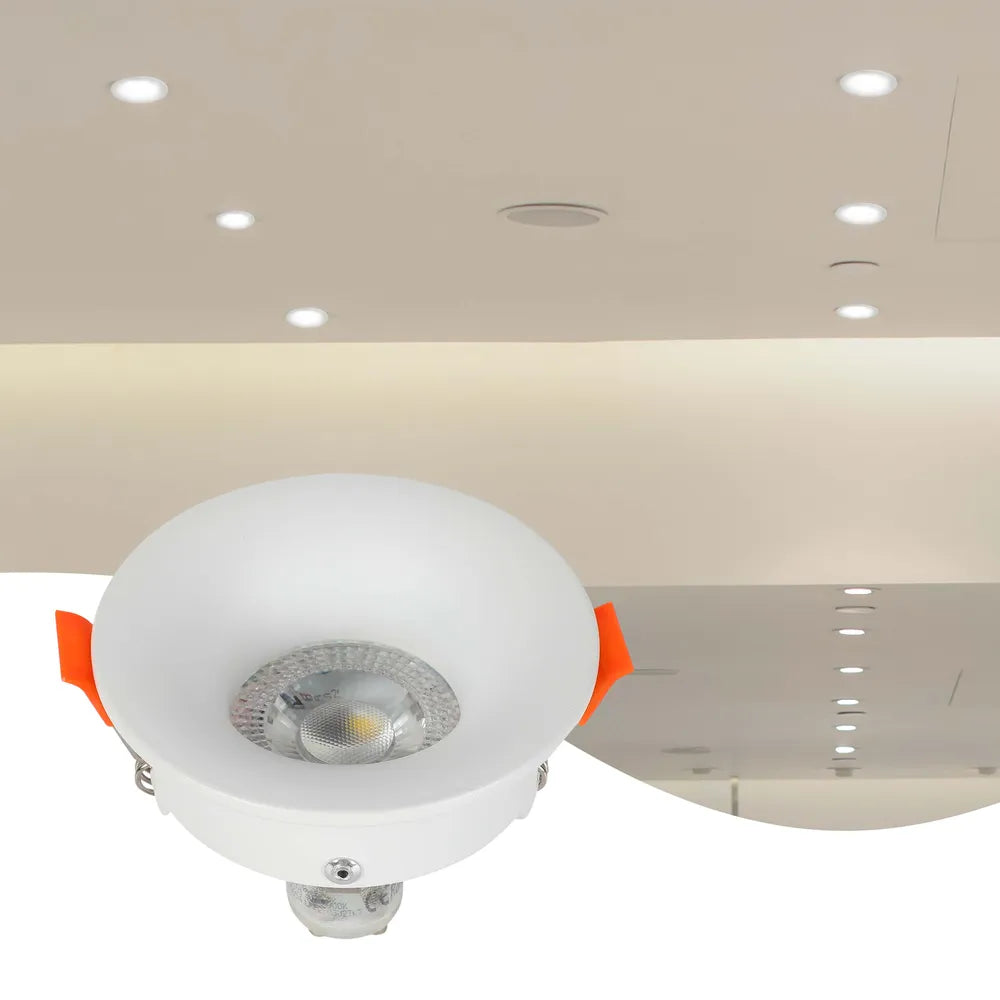 Modern GU10 downlight fixture in a bright, minimalist living room, enhancing the sleek decor with a low-glare design for optimal lighting.143-03993