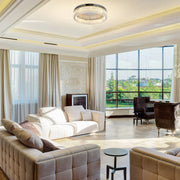 Круглая хрустальная потолочная люстра с хромированной основой, идеально подходящая для современных гостиных или спален.