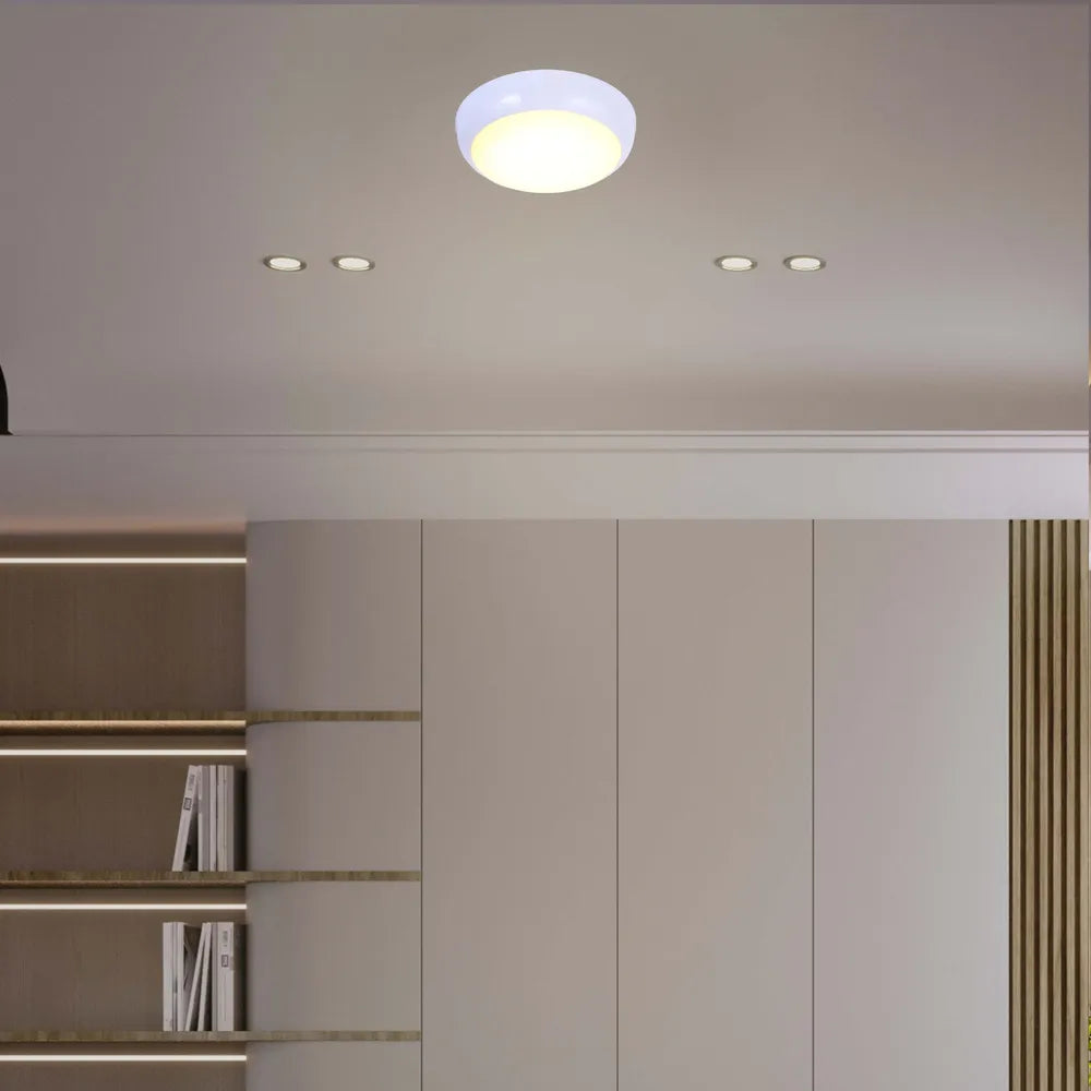 Modern LED flush ceiling light in a stylish kitchen with white decor, enhancing illumination and elegance in a contemporary setting.118-03620