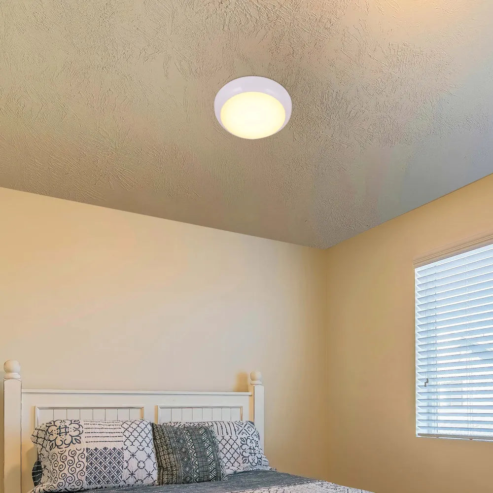 LED Flush Ceiling Light in modern kitchen with sleek white decor, providing versatile lighting with IP54 protection for damp areas.118-03622