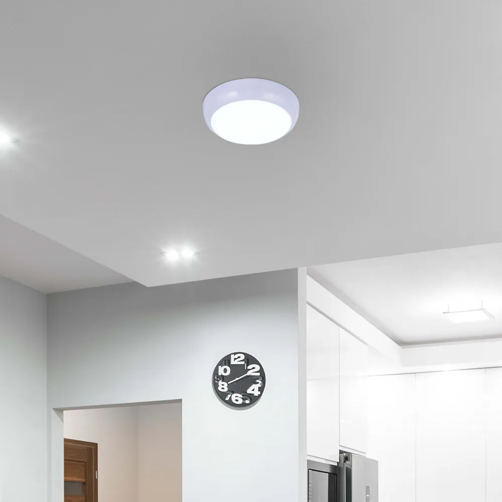 LED flush ceiling light in a modern kitchen, complementing sleek cabinetry and a bright, airy ambiance. Ideal for functional yet stylish lighting.118-03622