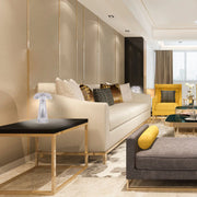 Светильник в форме грибка на столе в уютном living room, идеально подходит для современного интерьера и создания атмосферы.