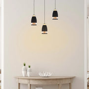Sleek pendant downlight featuring a polycarbonate ring diffuser, illuminating a modern kitchen with warm white light. Perfect for stylish decor.150-19080